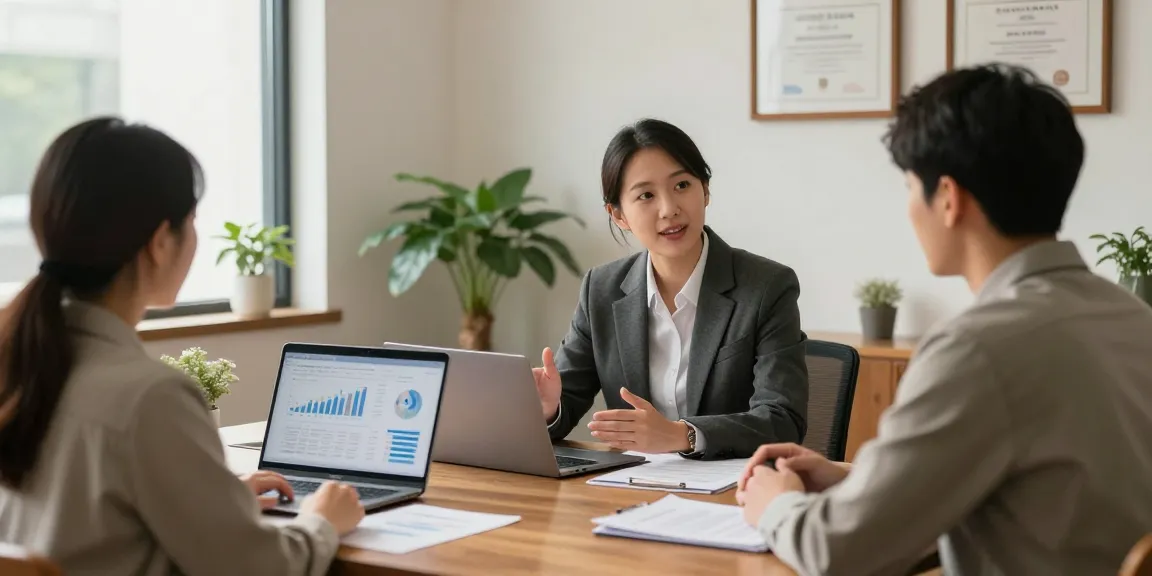 Financial advisor Reston VA consulting clients in a modern office with personalized planning materials
